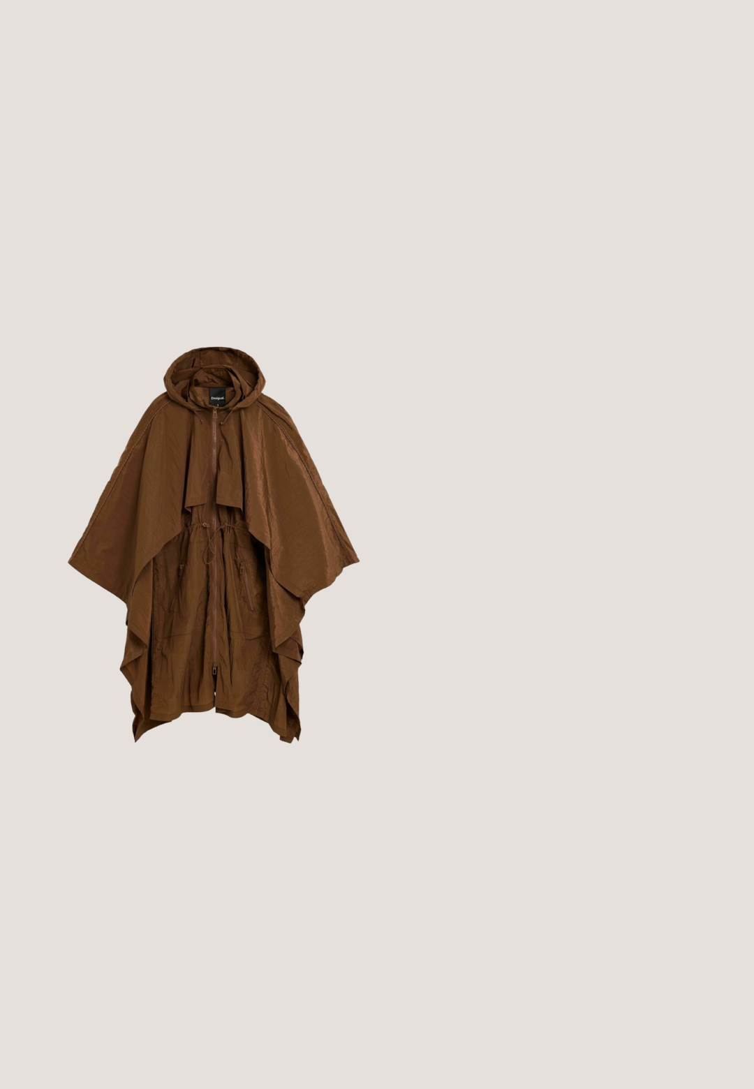 Cape manteau marron à capuche avec fermeture éclair devant, taille coulissée et poches latérales, en tissu léger texturé.; Haut sans manches marron foncé à col halter profond en V avec broderies florales complexes et détails en sequins sur tissu léger.; Jupe courte marron à ourlet évasé et une rangée horizontale de petits clous argentés à l'avant, près de la taille.; Bottines en cuir gris hauteur mollet avec un design décontracté, bout pointu et talon empilé. Détails de couture remarquables sur la zone des orteils.; Lunettes de soleil en écaille de tortue avec des verres polarisés marron. Forme rectangulaire avec une finition lisse. Gravé "vogue" près de la branche.; Sac à main rond en cuir marron foncé avec motif étoile à clous argentés, poignée supérieure, bandoulière réglable et fermeture éclair.