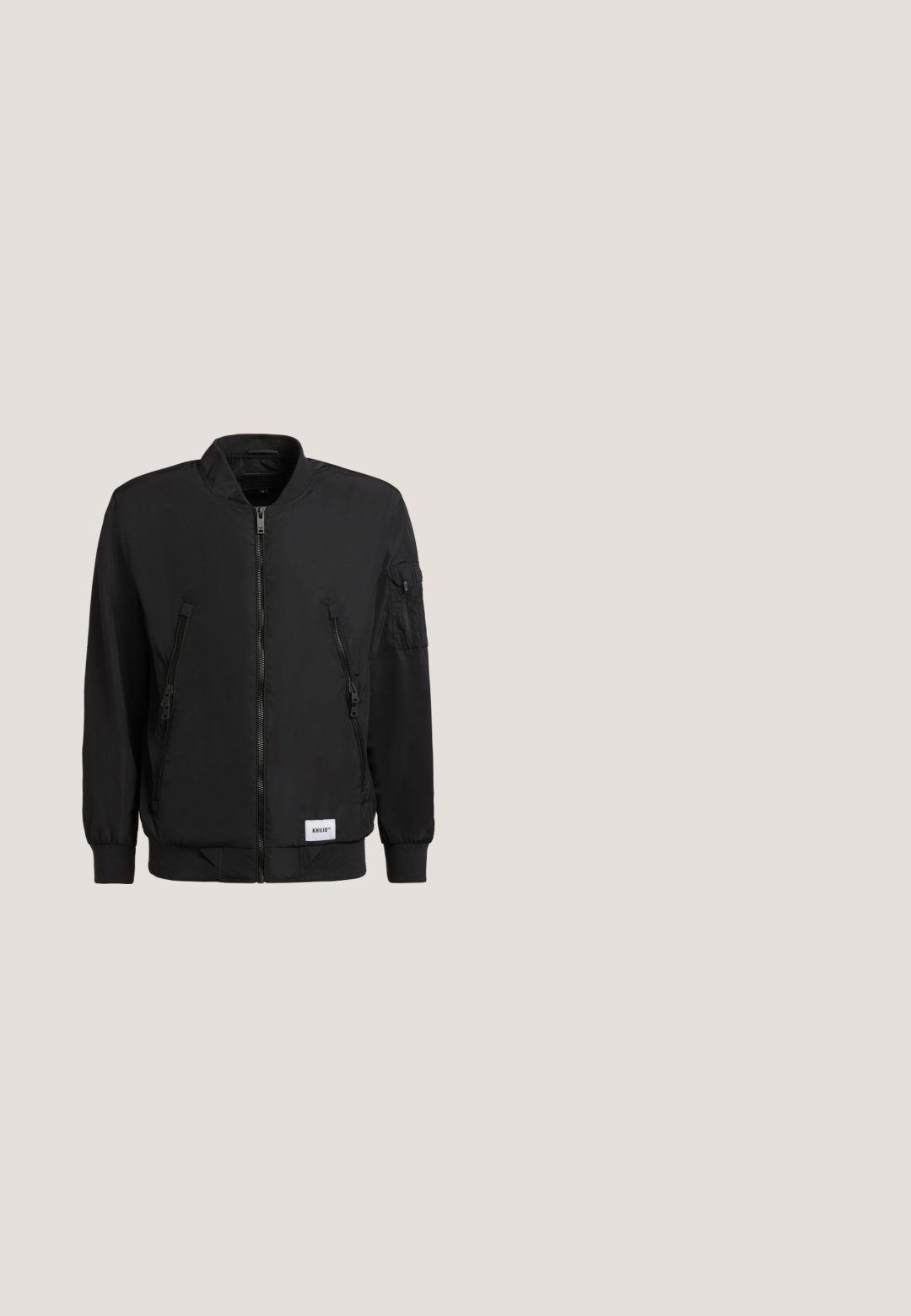 Veste bomber noire en tissu lisse, dotée d'une fermeture éclair sur le devant, de deux poches latérales et d'une poche à patch sur la manche gauche.; Pull-over noir à col zippé fabriqué en tissu tricoté, avec des manches longues, des poignets et un ourlet côtelés, featuring une fermeture éclair argentée au cou.; T-shirt noir uni à manches courtes, col rond, coupe droite sans motifs ni logos visibles.; Pantalon gris en tissu texturé et tissé ; coupe ajustée ; design à cinq poches ; fermeture à bouton ; chevilles fuselées ; motif subtil.; Chaussures en cuir noir à lacets avec une texture lisse, un bout arrondi et des détails de couture discrets. Présentent une languette rouge à l'arrière.; Sac crossbody noir en tissu texturé avec fermeture éclair. Présente un accent logo et une sangle ajustable à motif. Design compact et carré.