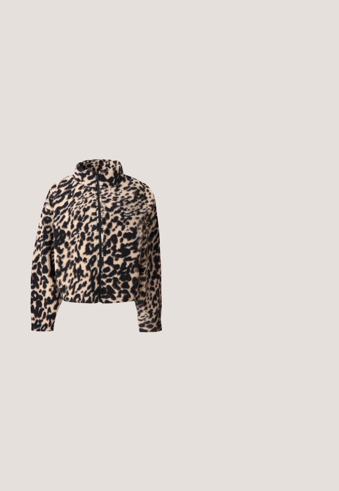 Fuzzy leopard print zip-up jacket with high collar and long sleeves, featuring a small Volcom logo on the chest.; Black and white fleece pullover with large floral pattern, long sleeves, high collar, and front half-zip closure.; Black short-sleeve T-shirt with a small light green yin-yang symbol surrounded by a swirl pattern on the upper left chest.; Black wide-leg pants with brown and pink striped waistband, drawstring tie, and white floral embroidery on the right hip.; Black suede slip-on shoes with a thick rubber sole, featuring a rounded toe, decorative pom-poms, and stitched detailing.; Black quilted tote bag with two handles and an adjustable shoulder strap, featuring a front flap pocket on a plain background.