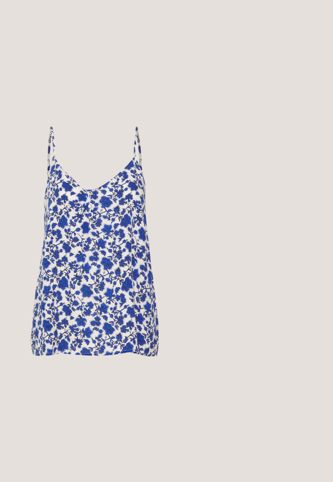 ONLY ONLVIOLA BUTTON SINGLET - Débardeur - dazzling blue seascape; Pantalon en denim bleu foncé à jambes larges. Il présente un devant plat avec cinq boutons dorés pour la fermeture. Texture lisse avec une finition classique.; Mule blanche à bout ouvert avec talon bloc sur sol pavé près d'un mur carrelé, inclinée pour montrer les vues latérale et supérieure.; Lunettes carrées en plastique transparent avec des verres translucides, dotées d'accents dorés sur les branches pour plus de détails.; Sac à main en cuir synthétique blanc avec une forme triangulaire structurée, une bandoulière unique réglable et un rabat à courbes accentuées.; Boucles d'oreilles en argent en forme de cerceau avec un charme croix et cœur. Texture lisse et brillante avec une finition polie. Chaque charmepend d'une boucle sécurisée.
