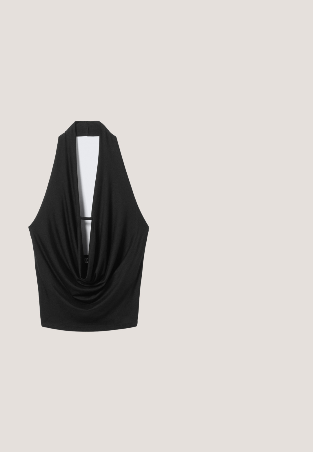 Black sleeveless halter top with deep draped neckline and open back, hanging against a light gray background.; Black flared skirt with a fitted waist, featuring vertical seams and a smooth texture. Hemline is slightly curved and above mid-thigh.; Black leather knee-high boot featuring a rounded toe, chunky block heel, and textured sole, with a soft, slouchy design.; Black cat-eye sunglasses with dark lenses, glossy plastic frame, and silver hardware accents on the temples. Smooth texture throughout.; Black leather shoulder bag with adjustable strap, two front vertical zippers, and a small metallic wing emblem below the zippers.; Silver star-shaped hoop earrings with a smooth, polished finish on a plain white background.