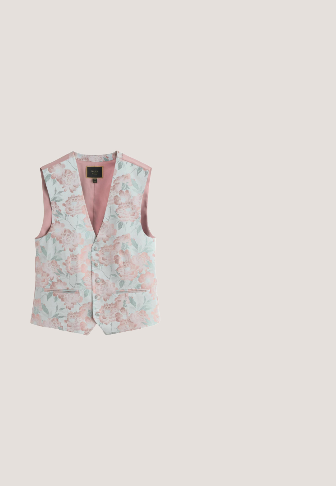 Lyserød satin stof med en glat tekstur, der har en sølvmetal spænde på en matchende rem. Designet er slankt og enkelt.; Blomstret langærmet skjorte med en lysebrun baggrund, med lyserøde og blå blomster, knappet front og standard krave.; Herre, skræddersyede, slanke bukser i afdæmpet mauve med bæltestropper, sidelommer og frontlynlås, lagt fladt på hvid baggrund.; Lyserød ruskindsko med rund tå, snøre-design og en cremefarvet accentmærke. Har en tan gummisål for ekstra greb.; Runde solbriller med en mønstrede mørk skildpaddeskal ramme, lyserøde linser og et metal logo puder ved stellet.; Strikket smalt slips i støvet pink med et tekstureret mønster, vist lodret mod en hvid baggrund.