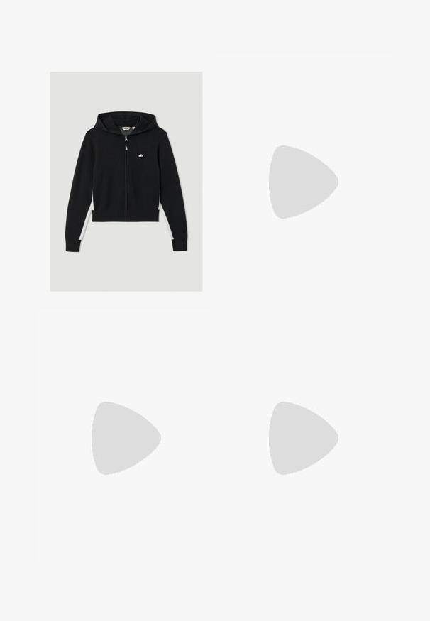 Sudadera con cremallera negra de diseño ajustado, con capucha, acentos laterales blancos y un pequeño logo en el pecho. Textura de tela suave.; Camiseta verde de manga corta, hecha de una tela suave, con escote redondo y un sutil acento de logo en la parte delantera.; Pantalones de pana negros con un diseño de pierna recta, que presentan un cierre de botón y bolsillo lateral. Textura suave con finas rayas verticales.; Zapatillas de lona negras con suela blanca, con un diseño recortado y una correa con hebilla dorada. Combinadas con pantalones de chándal rosas.