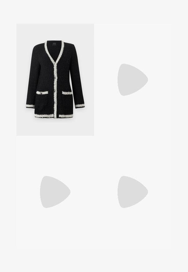 Cardigan noir texturé avec bordure blanche le long du col en V, fermeture par boutons, poches, poignets et ourlet.; Un haut sans manches noir avec une texture côtelée, un col rond et une coupe régulière. L'étiquette indique "IVY OAK". Pas de motifs ou d'accents supplémentaires.; Jean en denim blanc avec taille haute, coupe droite, deux poches avant et une seule poche arrière. Comprend un bouton en métal et une fermeture éclair.; Sandale noire à talon haut avec une large bride avant et une boucle d'orteil dotée d'un détail de corde nouée, vue de profil sur fond blanc.