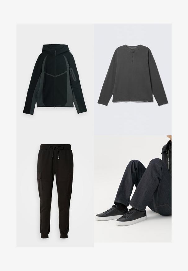 Sudadera negra y gris oscuro con cremallera frontal, gran capucha y bolsillo lateral con cremallera. Presenta un diseño estructurado y paneles en contraste.; Camiseta henley de manga larga en gris oscuro con escote redondo y tres botones en la tapeta frontal.; Pantalones de chándal negros con cintura elástica y cordón. Presenta bolsillos tipo cargo a los lados y puños elásticos en los tobillos.; Persona sentada con las piernas dobladas, vistiendo vaqueros azul oscuro y zapatillas bajas negras con suelas blancas sobre un fondo blanco.