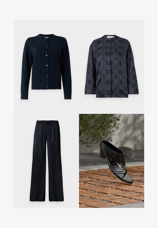 Cardigan noir à manches longues boutonné avec un col rond et un tissu doux et texturé sur fond neutre.; Blouse marine avec un motif géométrique blanc, dotée d'un col mandarin et de manches longues, fabriquée en tissu lisse et brillant.; Pantalons larges en tissu foncé avec un motif léopard noir discret, une taille élastique et une coupe confortable.; Sandale noire à talon haut avec une lanière entre les orteils, flottant au-dessus d'une surface extérieure en bois et gravier à motifs, avec un arrière-plan flou de verdure et un mur.