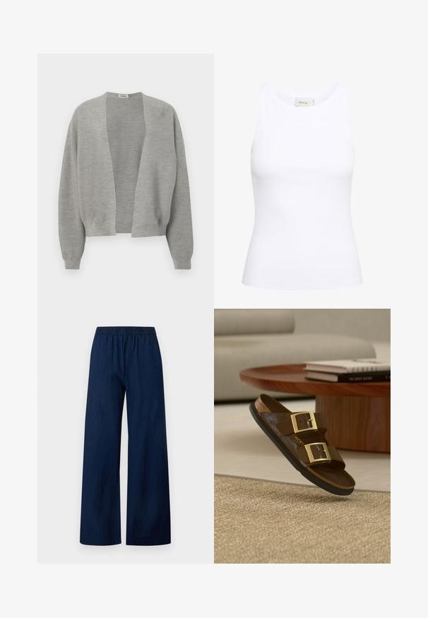 Cardigan gris en tissu tricoté doux, design à l'avant ouvert, épaules tombantes et poignets côtelés pour une coupe décontractée.; Débardeur blanc côtelé avec un col rond et sans manches. Tissu extensible et design ajusté. Étiquette au dos indiquant "GESTUZ."; Pantalon bleu marine à jambes larges avec taille élastique et devant plat, en tissu léger.; Sandale mule en cuir marron avec deux boucles dorées, semelle noire, posée près d'une table basse en bois avec des livres empilés dans un salon beige.