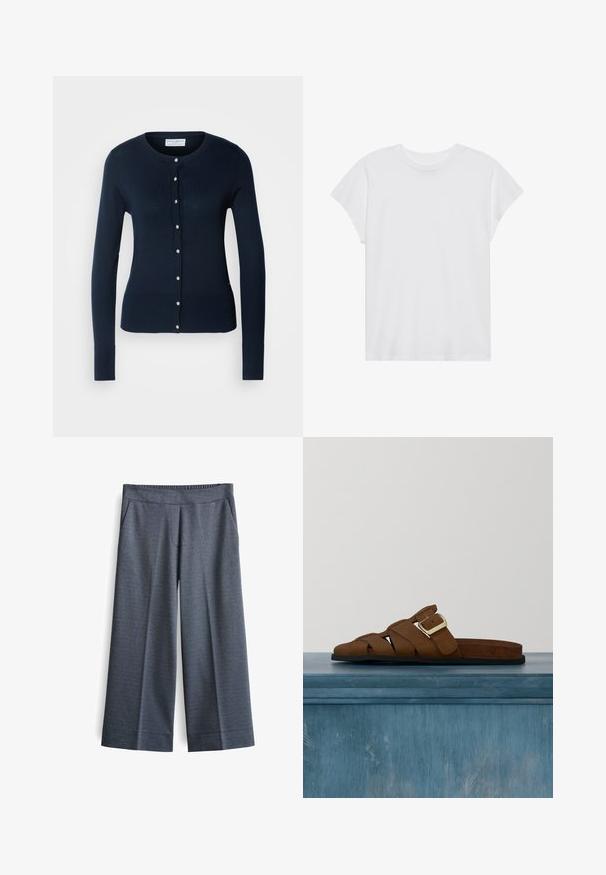 Marineblauwe gebreide cardigan met lange mouwen, geribbelde manchetten en een knoopsluiting aan de voorkant met kleine goudkleurige knopen.; Witte t-shirt met korte mouwen, ronde hals, relaxte pasvorm, gemaakt van zacht katoen. Glad textuur, geen patronen of logo's.; Wijde broek in donkergrijze stof. Voorzien van een elastische tailleband, twee voorkantzakken en een gladde textuur met een subtiel patroon.; Bruine leren sandaal met gouden gesp en zwarte zool, zwevend boven een gladde betonnen vloer met een achtergrond van verticaal gestreept glas.