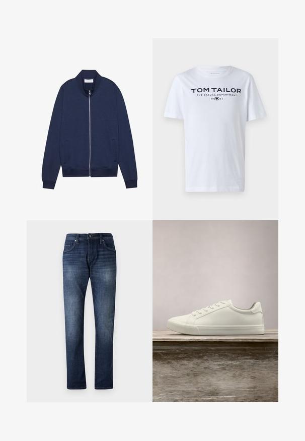 Marineblå zip-up jakke i bomuldsblanding, med høj krave, sidelommer, ribbede manchetter og kant, samt subtil tekstur og minimalistisk design.; Hvid bomulds t-shirt med rund hals, korte ærmer og navy tekst, der læser "TOM TAILOR THE CASUAL DEPARTMENT 1962."; Mørkeblå denimjeans med lige ben design, der har en falmet vask, fem lommer og synlige stikninger langs sømmene.; Hvide snørresneakers svævende over en træbænk med grønne planter i baggrunden, der fremhæver skodesign og tekstur.