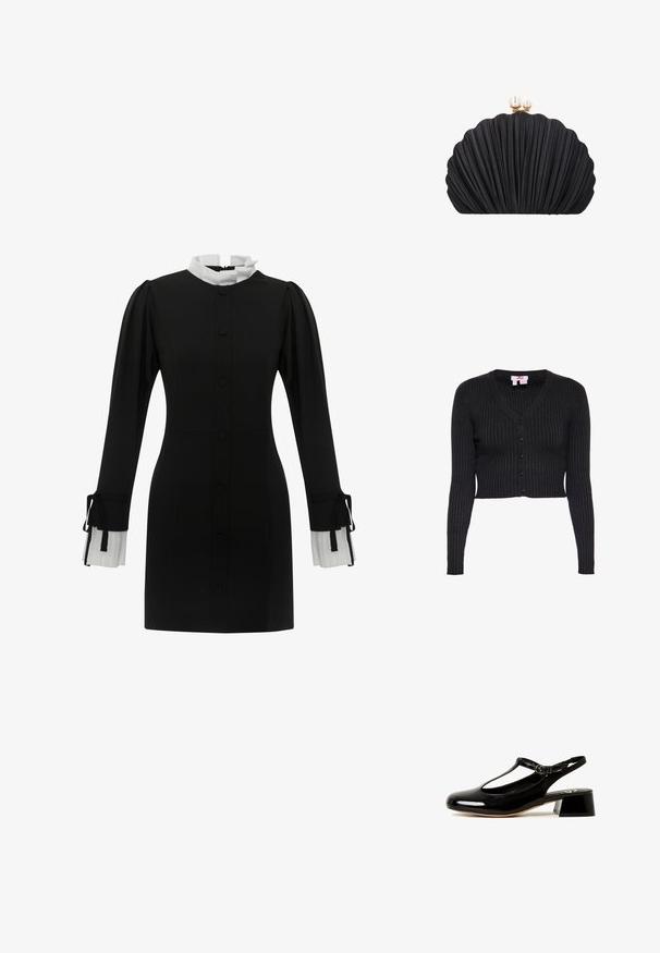 Sort ribstrikket cropped cardigan med lange ærmer, V-hals og fem knapper foran, størrelse small.; Sort kjole med høj hvid krave, knappelukning foran og lange ærmer med plisserede hvide manchetter med snore. Glat stoftekstur.; Sort slingback-sko i laklæder med T-remdesign, spids snude og kraftig blokhæl. Har en lukning med spænde på siden.; Sort clutch taske formet som en skal med plisseret tekstur og guldlås toppet med to perledekorationer.