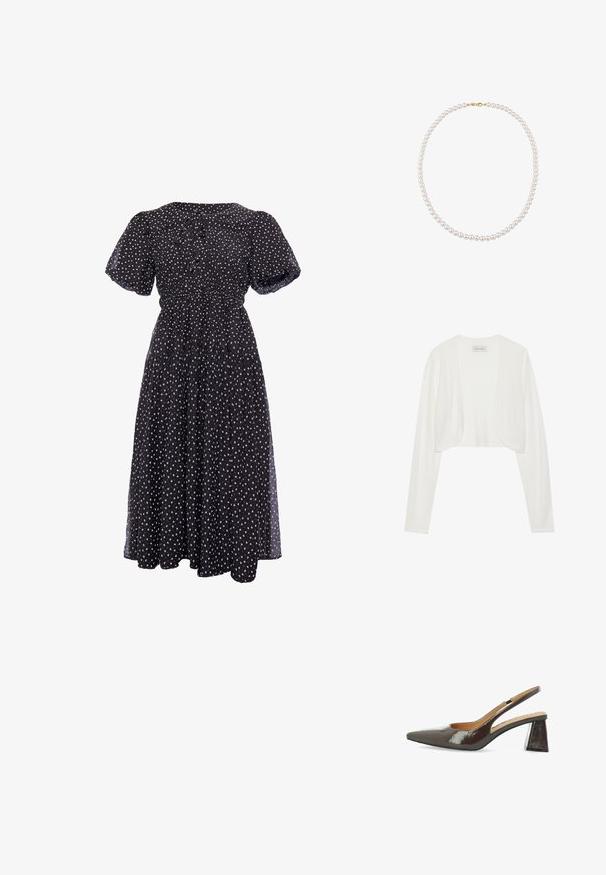 Hvid cropped cardigan, lange ærmer, blød strikstruktur, åben frontdesign, mærket siger "ANNA FIELD", minimalistisk stil uden lukninger.; Sort midi-kjole med lille hvidt blomsterprint, puffede ærmer, markeret talje og rund halsudskæring med bindedetalje.; Slingback højhælede sko i blank, mørkebrun patentlæder, spids tå, udskårne sider og en firkantet blokhæl.; Enkelt trådet perlekrave med små runde hvide perler og en guldlås på en hvid baggrund.