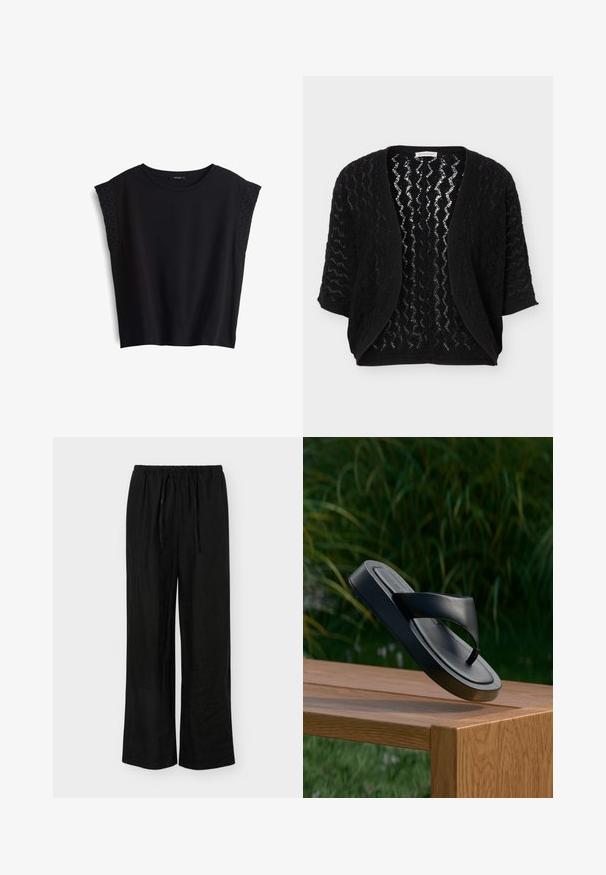 Schwarzer Cardigan mit offenem Vorderteil, dreiviertel Ärmeln und strukturiertem Zickzack-Spitzenmuster.; Schwarzes Kurzarmoberteil mit rundem Halsausschnitt. Weicher Stoff mit strukturierten, gestickten Akzenten an den Schultern. Legere Passform, ohne Verschlüsse.; Schwarze Hosen mit weitem Bein, elastischem Bund und Kordelzug, aus leichtem Stoff, vor weißem Hintergrund gezeigt.; Schwarze Lederflip-Flop-Sandale, die über einer Holzbank im Freien schwebt, mit hohem grünem Gras unscharf im Hintergrund.