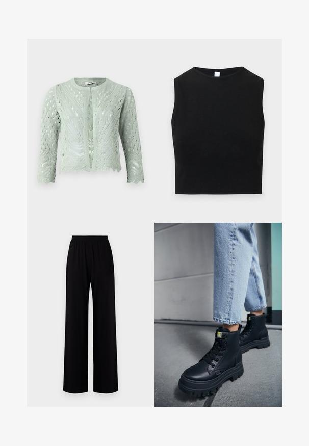 Hellgrüner, gestrickter Cardigan mit Lochmuster, Dreiviertelärmeln und gewelltem Saum. Entworfen mit einem runden Halsausschnitt und ohne Verschlüsse.; Schwarzes, kurz geschnittenes Tanktop aus einem glatten, elastischen Stoff. Verfügt über einen Rundhalsausschnitt und ein ärmelloses Design mit einer klaren, minimalistischen Silhouette.; Schwarze weit geschnittene Hose mit elastischem Bund, aus glattem Stoff gefertigt, mit einem schlichten Design und ohne sichtbare Muster oder Verzierungen.; Person, die hellblaue Jeans und schwarze klobige Schnürstiefel trägt und auf einem Betonboden nahe einer Wand steht.