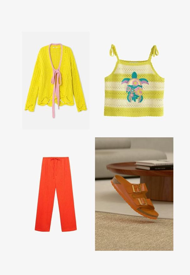 Cárdigan de punto grueso amarillo con mangas largas, cierre de lazo rosa en el escote en V y detalle de dobladillo con bordes moldeados.; Top de tirantes a rayas amarillas y crema tejido a crochet con tiras para atar y un colorido motivo floral de tortuga centrado en la parte delantera.; Pantalones anchos rojos, hechos de un tejido texturizado con acanalado vertical y una cinturilla elástica con cordón para ajustarse.; Sandalia tipo slide naranja con dos hebillas doradas y suela de corcho, suspendida sobre una alfombra texturizada beige en la sala de estar cerca de una mesa de madera con libros apilados.