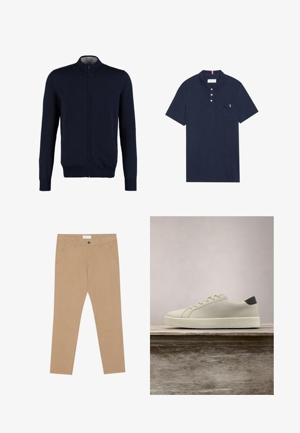 Gilet zippé bleu marine avec un col montant, des bords côtelés aux poignets et à l'ourlet, une texture lisse et des poches latérales. Design en tricot plat.; Polo-shirt marine en coton avec un col, une patte de boutonnage à trois boutons et une poche poitrine gauche avec une bande d'accent rouge, blanche et bleue.; Chinos kaki en coton mélangé, dotés d'un devant plat, de deux poches latérales et d'une poche arrière unique. Tissu léger avec une texture lisse.; Baskets blanches avec semelle texturée et détail noir au talon, flottant au-dessus d'un banc en bois avec de hautes herbes vertes en arrière-plan.