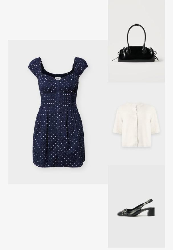 Cardigan en maille crème à manches courtes avec col rond et cinq boutons sur le devant, sur un fond clair uni.; Robe courte bleu marine à pois blancs, avec boutons sur le devant, taille froncée et petites manches volantées.; Sandale à talon en cuir noir avec un bout pointu, une sangle texturée ornée d'accents métalliques circulaires et un talon empilé.; Petit sac à main noir brillant avec deux longues anses et des détails à cordon sur les côtés sur un fond clair uni.
