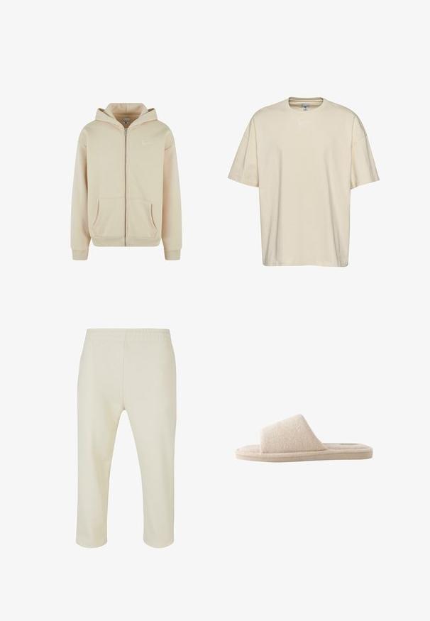 Sudadera con cremallera color beige, con bolsillos frontales, puños y cintura de canalé. Presenta un pequeño logo blanco en el área del pecho izquierdo. Textura de tela suave.; Camiseta de algodón beige con cuello redondo, mangas cortas y un corte holgado. Presenta un sutil bordado de logotipo blanco en el pecho.; Pantalones cortos beiges hechos de una tela suave. Cintura elástica sin cierres visibles. Diseño de pierna recta con una textura lisa.; Zapatilla beige de tela suave, con puntera abierta, suela gruesa y una amplia tira en la parte superior para uso en interiores.