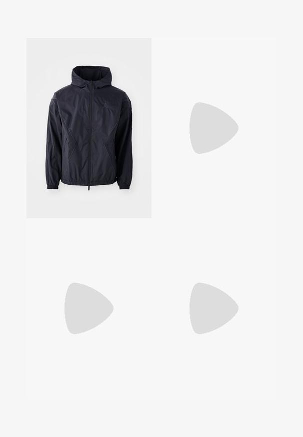 Sort vindjakke med hætte, der har fuld lynlås, elastiske manchetter og sidelommer. Teksturstof med geometriske syninger.; Grå crewneck sweatshirt lavet af fleece-materiale, med ribbede manchetter og kant, samt et lille hvidt logo på brystet.; Sorte kordfløjl bukser med en afslappet pasform, der har en klassisk talje og flagrende ben, blød tekstur og uden synlige mønstre eller detaljer.; Nike SB sneakers i lys grå og creme, med en overdel i ruskind, sort swoosh, strukturerede detaljer og hvid gummisål.