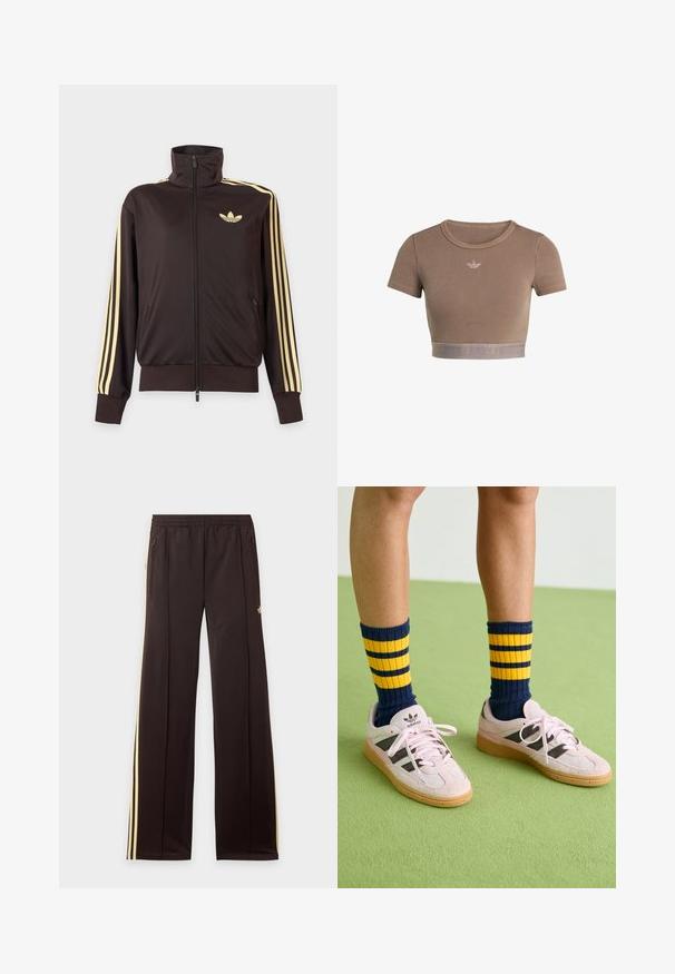 Schwarze Trainingsjacke mit Reißverschluss und hohem Kragen, hellgelben Streifen an den Ärmeln und Adidas Trefoil Logo auf der linken Brust.; Braunes, geripptes Crop-Top mit kurzen Ärmeln, rundem Ausschnitt und einem strukturierten Saumband am unteren Rand mit einem dezenten Logomuster.; Schwarze Jogginghose mit gelben Seitenstreifen, elastischem Bund, seitlichen Reißverschlusstaschen und kleinem Logo am oberen Oberschenkel.; Helle rosa Wildledersneaker mit schwarzen Streifen und Gummisohlen, kombiniert mit navyblauen und gelben gestreiften Rippsocken. Grüner strukturierter Boden.