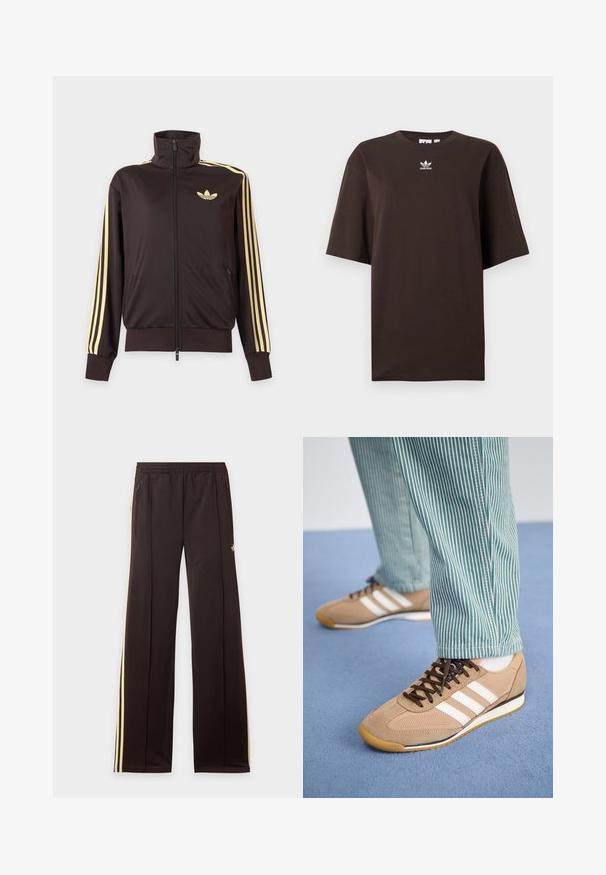 Sort lynlåstrøje med høj krave, lysegule striber ned ad ærmerne og Adidas trefoil-logo på venstre bryst.; Mørkebrunt oversized Adidas T-shirt med korte ærmer og lille hvid Adidas-logo centreret under halsudskæringen.; Sorte træningsbukser med gule sidelister, elastisk taljebånd, lynlåslommer i siderne og en lille logo på den øvre lår.; Tan ruskind og mesh sneakers med brune snørebånd og tre hvide striber. Parret med grønne og hvide stribede bukser, hviler på en blå overflade.