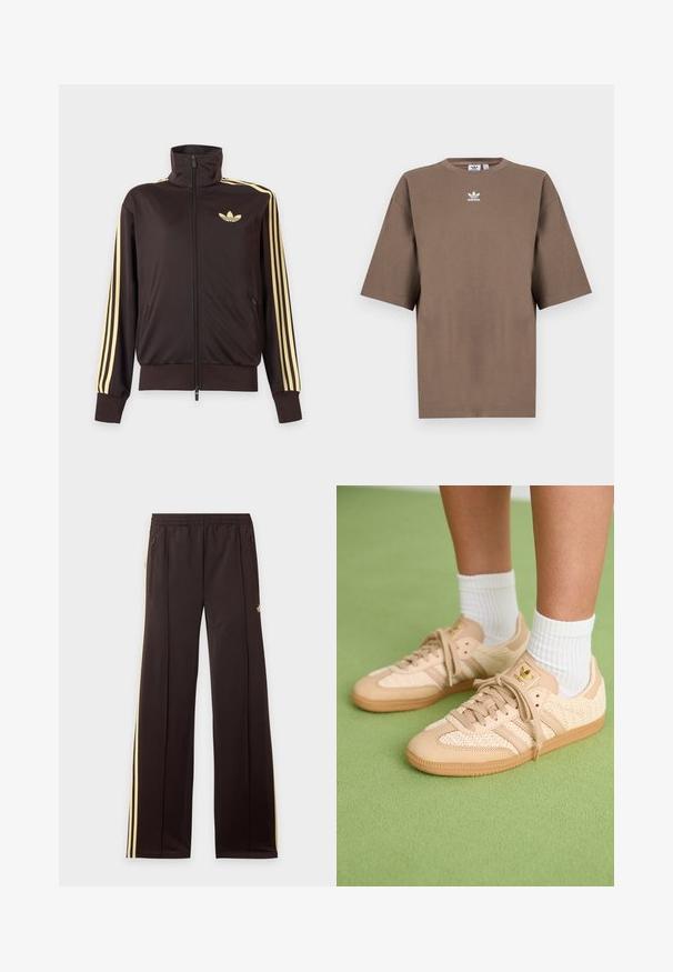 Sort lynlåstrøje med høj krave, lysegule striber ned ad ærmerne og Adidas trefoil-logo på venstre bryst.; Brun bomulds t-shirt med korte ærmer, rund hals og hvid Adidas-logo centreret på brystet, som har et enkelt design og en afslappet pasform.; Sorte træningsbukser med gule sidelister, elastisk taljebånd, lynlåslommer i siderne og en lille logo på den øvre lår.; Fødder iført beige vævede Adidas sneakers med gummisåler og hvide ankelsokker på en grøn struktureret gulv.