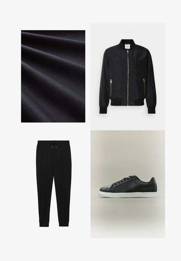 Schwarze Bomberjacke mit Reißverschluss vorne, geripptem Kragen und Bündchen, seitlichen Reißverschlusstaschen und einer eleganten, glatten Textur.; Schwarzer Stoff mit glatter Textur, der gefaltete Lagen aufweist, die sanfte Wellen erzeugen und die weiche, matte Oberfläche betonen.; Schwarze Sporthosen mit Kordelzugbund, schmal zulaufenden Beinen und gerippten Bündchen. Hergestellt aus einem weichen Stoff mit glatter Textur.; Schwarzer Sneaker mit niedrigem Schaft, weißer Gummisohle und schwarzen Schnürsenkeln, seitlich auf hellem beigem Hintergrund dargestellt.