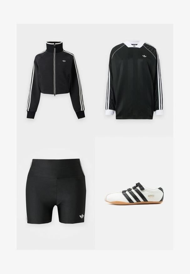 Zwarte cropped jas met rits en hoge kraag, witte strepen langs de mouwen en klein wit Adidas-logo op de linkerborst.; Zwart shirt met lange mouwen en een V-hals, met verticale strepen, witte accenten en drie witte strepen op elke mouw. Klein logo op de borst.; Zwarte atletische shorts van rekbaar materiaal met een hoge taille. Bevatte witte zijstrepen en een klein wit logo aan de zoom.; Witte Adidas Tokyo sneaker met zwarte strepen, zwarte klittenbandsluitingen en een gumzool, zijaanzicht op een witte achtergrond.