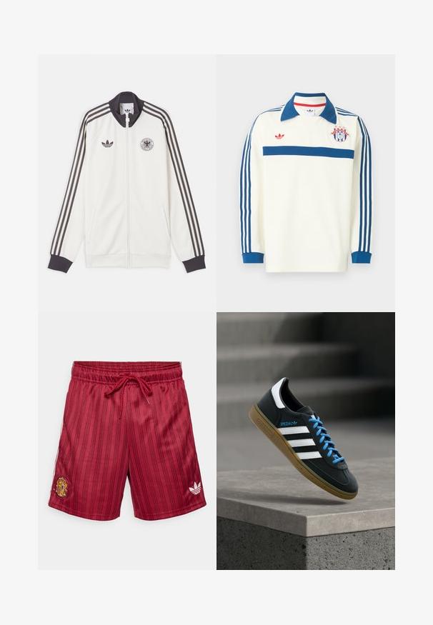 Άσπρο αθλητικό μπουφάν Adidas με μαύρες τρεις ρίγες στα μανίκια, μαύρο γιακά και μανσέτες, λογότυπο Adidas και έμβλημα της Γερμανικής ποδοσφαιρικής ομοσπονδίας.; Λευκή αθλητική φανέλα μακρυμάνικη με μπλε γιακά, μπλε ρίγες στα μανίκια, μπλε ρίγα στο στήθος, κόκκινο λογότυπο και έμβλημα ασπίδας με αστέρια στο στήθος.; Κόκκινα ριγέ σορτς από ελαφρύ ύφασμα, με ελαστική μέση και κορδόνι, καθώς και κεντημένο λογότυπο στο αριστερό πόδι.; Μαύρο αθλητικό παπούτσι Adidas με λευκές ρίγες, μπλε κορδόνια και καουτσούκ σόλα να αιωρείται πάνω από γκρίζο τσιμεντένιο σκαλοπάτι σε απαλό φως.
