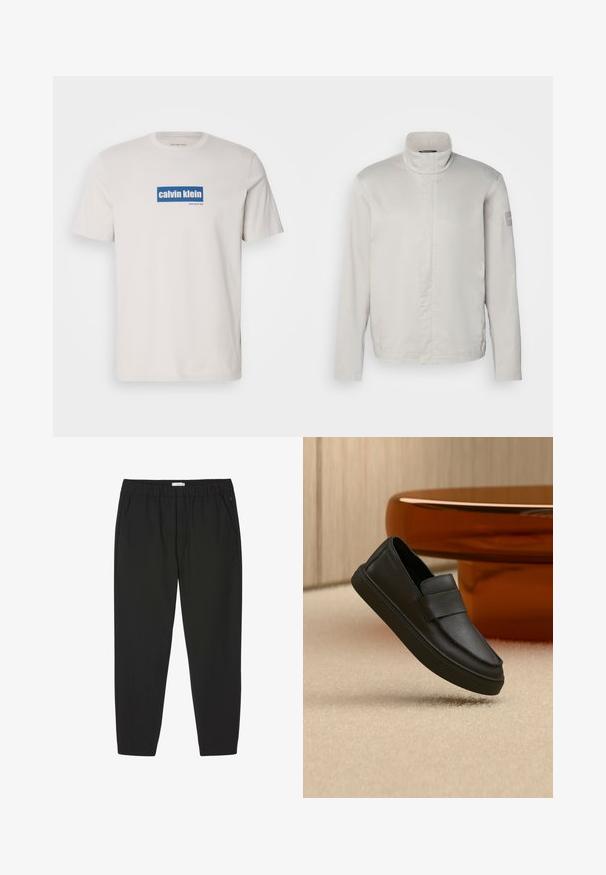 Lichtgrijze, lange mouwen jas met hoge kraag, gladde textuur, sluiting aan de voorkant en subtiele branding op de mouw. Minimalistisch ontwerp.; Witte katoenen t-shirt met een blauw rechthoekig logo met "calvin klein" en "new york city" in witte tekst op de voorkant. Klassieke pasvorm.; Zwarte broek met elastische taille, rechte pijpen en zijzakken, ontworpen voor casual of professioneel gebruik.; Zwarte leren instaploafer met een band over het bovenwerk, geplaatst op een beige tapijt en naast een bruine ronde tafel.