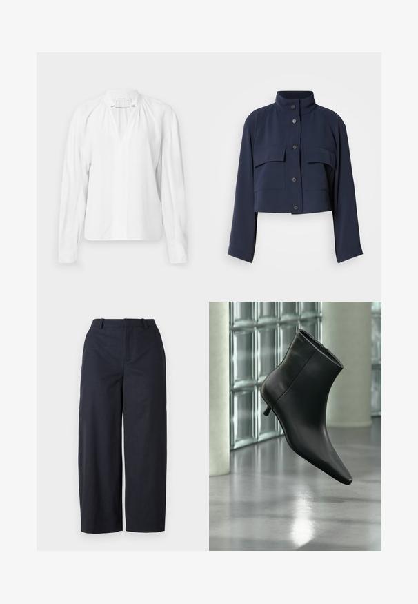 Chaqueta corta azul marino con mangas largas, cuello alto, cierre frontal con botones y dos grandes bolsillos con solapa en el pecho.; Blusa blanca de manga larga con escote en V, detalles fruncidos en el cuello y una tela suave y ligera. Diseño simple y minimalista.; Pantalones de pierna ancha en color navy con una textura suave, parte delantera plana y cinturilla. Fabricados en un tejido ligero, que ofrece un ajuste relajado.; Botín negro de cuero con punta puntiaguda y tacón bajo estilo kitten, mostrado en ángulo sobre un suelo pulido y con una pared de bloques de vidrio de fondo.