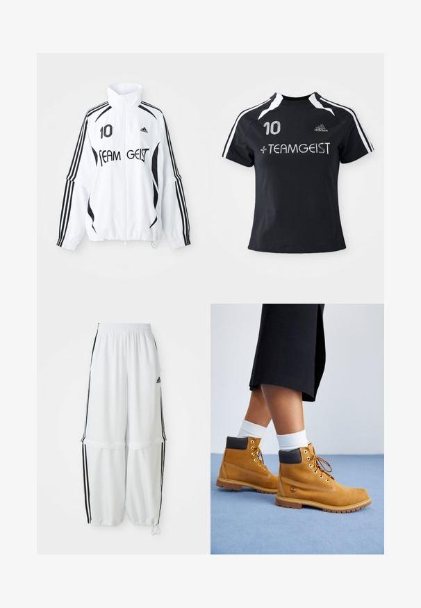 Veste blanche avec accents noirs, dotée d'un col haut, d'un zip à l'avant, du logo Adidas, d'un grand imprimé "10" et du texte "TEAM GEIST". три строчки.; Maillot noir à manches courtes avec des rayures blanches, arborant le numéro "10" et " + TEAMGEIST" brodés sur le devant. Fabriqué à partir d'un matériau doux et respirant.; Pantalons de sport blancs avec une coupe décontractée, une taille élastique et des rayures noires sur les côtés. Équipés de poches avec fermeture éclair et de poignets élastiques aux chevilles.; Bottines en suede beige avec des accents en cuir marron, des œillets dorés et une semelle texturée. Chaussettes blanches visibles au-dessus des bottines.