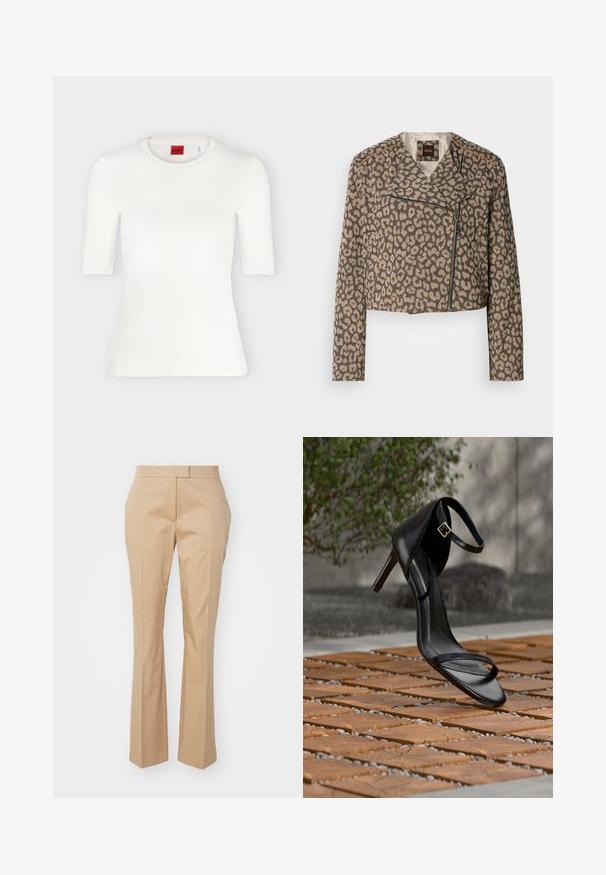 Veste de motard raccourcie en tissu texturé beige avec imprimé léopard noir. Elle dispose d'une fermeture éclair diagonale, d'un col cranté et de deux poches latérales.; T-shirt blanc ajusté à manches courtes avec col rond et étiquette de marque rouge à l'intérieur du col.; Pantalons beiges ajustés avec une coupe droite, fabriqués en tissu lisse, présentant un devant plat et sans poches visibles.; Sandale noire à talon haut avec sangle à la cheville, suspendue au-dessus d'un sol en carreaux de bois à l'extérieur, avec un arrière-plan flou de verdure et de pierre.