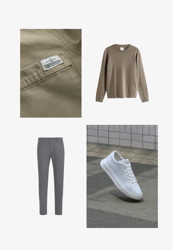 Khaki stof met een gestructureerd oppervlak, met een wit label op een zak genaaid—de tekst bevat "ESTD 1982," "STANDARD ISSUE," en een referentie voor de levering.; Lange mouw taupe geribbelde trui met ronde hals en aansluitende cuffs, gemaakt van zachte gebreide stof.; Grijze katoenen broek met een aansluitend ontwerp, voorzien van een knoopsluiting, standaardzakken en een gladde textuur.; Witte lage sneaker met veters zwevend boven gestructureerd asfalt en een beige betegeld oppervlak op de achtergrond.