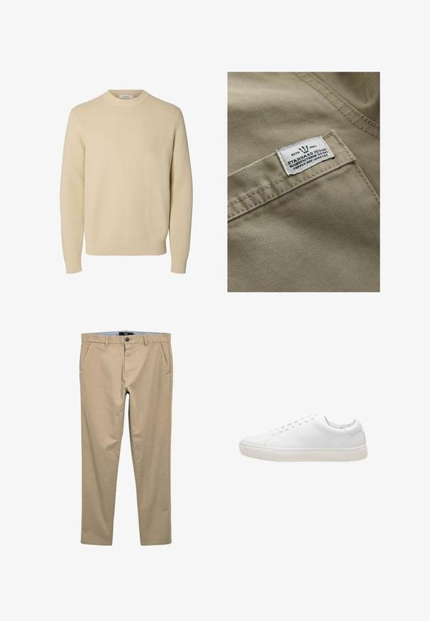 Khaki stof met een gestructureerd oppervlak, met een wit label op een zak genaaid—de tekst bevat "ESTD 1982," "STANDARD ISSUE," en een referentie voor de levering.; Effen beige ronde hals gebreide trui met lange mouwen en geribde boorden en zoom.; Beige chinos van een katoenmix; voorzien van voorzakken, een knoopsluiting en een rechte pasvorm. Soepele, matte textuur.; Witte leren sneaker met een gladde textuur, ronde neus, vetersluiting en een platte rubberen zool. Minimalistisch ontwerp zonder zichtbare patronen.