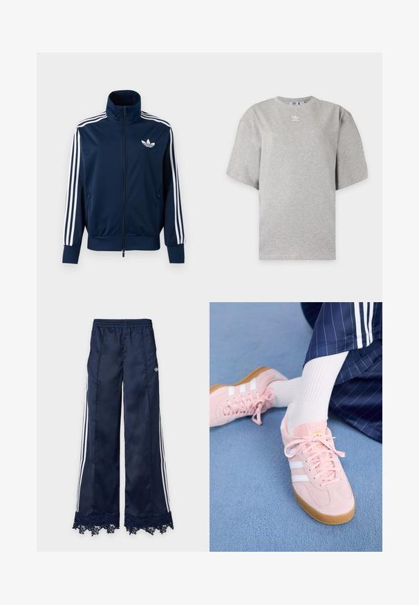 Marineblauw Adidas trainingsjack met witte strepen op de mouwen, volledige rits aan de voorkant, hoge kraag en wit trefoil-logo op de borst.; Lichtgrijs Adidas T-shirt met korte mouwen, ronde hals en klein wit Adidas-logo op de borst, weergegeven op een effen achtergrond.; Marineblauwe trainingsbroek met wijde pijpen, witte zijstrepen, elastische tailleband, adidas-logo op de heup en kantafwerking aan de zoom.; Lichtroze suède sneakers met witte strepen en veters, voorzien van een gestructureerde tong en een gumzool, geplaatst op een blauwe tapijt.