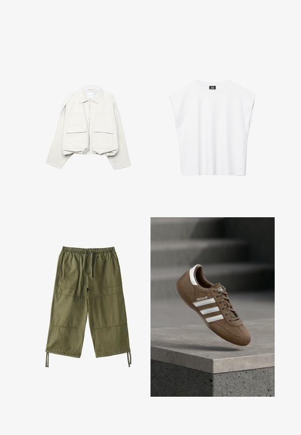 Lysebeige, cropped jakke med lange ærmer, krave, lynlås foran og to store klaplommer foran.; Hvid ærmeløs crop top med rund halsudskæring, brede skuldre og sort "B6"-label indvendigt i kraven.; Løse olivengrønne bukser med elastik i taljen, forlommer, snore ved benene og synlige sømdetaljer på benene.; Brun ruskind Adidas Spezial sneaker med hvide striber og snørebånd, svævende over en grå betonkantring mod en sløret baggrund af trapper.