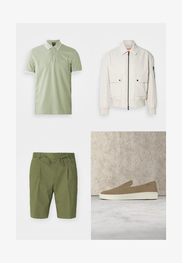 Αέρινο μπουφάν bomber με φερμουάρ, δύο μπροστινές τσέπες, ραμμένα μανίκια και λείος υφή. Διαθέτει μια διακριτική πορτοκαλί λεπτομέρεια στην εσωτερική πλευρά του γιακά.; Απαλή πράσινη πόλο μπλούζα από βαμβάκι, με κλασικό γιακά, δυο κουμπιά στο κλείσιμο και λευκή ραφή στον γιακά και τα μανίκια. Τετράγωνο λογότυπο στο στήθος.; Λαδί σορτς κατασκευασμένα από ελαφρύ ύφασμα, με ελαστική μέση και κορδόνι, πλισέ σχέδιο μπροστά και μήκος μέχρι το γόνατο.; Μπεζ παπούτσι τύπου slip-on με λευκή σόλα, εμφανίζεται στον αέρα πάνω από ένα ανοιχτό χαλί με διαφανή έπιπλα χρώματος κεχριμπαριού στο παρασκήνιο.