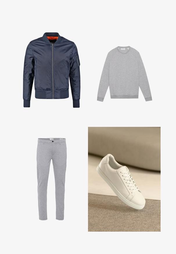 Veste de bombardier marine avec fermeture éclair à l'avant, poignets et taille côtelés. Doublée de tissu orange ; possède une poche sur la manche pour un détail supplémentaire.; Sweat-shirt à col rond gris clair à manches longues avec des poignets et un ourlet côtelés, présenté à plat sur un fond uni.; Pantalon slim gris clair avec fermeture par bouton et zip à l'avant, poches avant et passants pour ceinture.; Baskets en cuir blanc avec des lacets blancs, exposées sur une surface beige texturée et avec un arrière-plan flou doux.