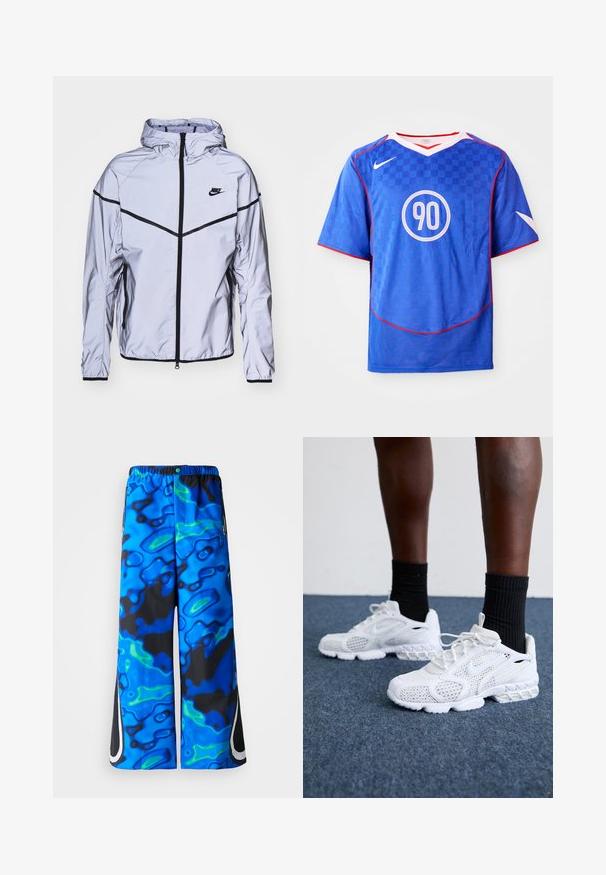 Nike Sportswear Let jakke / Sommerjakker - reflect silver; Blå Nike fodboldtrøje med ternet mønster, korte ærmer, v-hals design, hvide accenter og et centralt cirkulært "90" grafik.; Blå og sorte bukser med abstrakt mønster og bred benvidde, elaskisk talje samt lynlåslommer i siden på en ensfarvet baggrund.; Hvide atletik-sko med mesh-overdel, teksturerede accenter og polstret sål. Parret med sorte ribbede ankelstrømper på en blå tæppebelagt overflade.