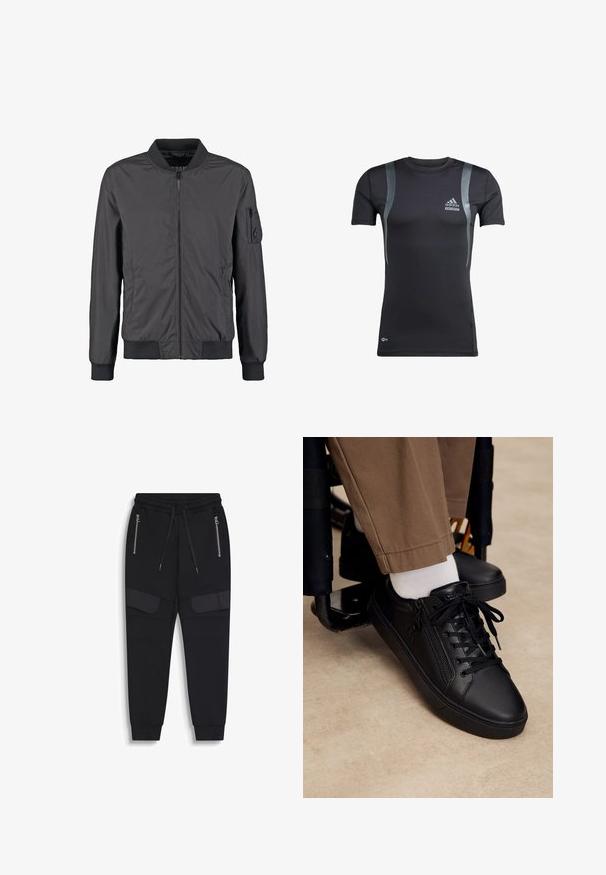 Chaqueta bomber negra con cremallera frontal, cuello, puños y dobladillo acanalados, y bolsillo con cremallera en la manga izquierda.; Camiseta deportiva negra de manga corta con detalles en gris, hecha de una tela elástica. Presenta un logo de Adidas en el lado izquierdo del pecho y la marca Techfit.; Pantalones jogger negros con cintura elástica, cordones, bolsillos laterales con cremallera y detalle adicional de tela en los muslos, tobillos con puños.; Zapatilla deportiva de cuero negro con cordones y cremallera lateral, usada con calcetines blancos y pantalones marrones, pie apoyado en el reposapiés de una silla de ruedas.