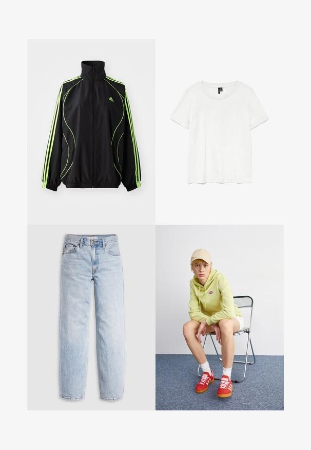 adidas Originals TEAMGEIST ADICOLOR - Ľahká bunda - black/signal green; Biela tričko s krátkym rukávom a okrúhlym výstrihom, vyrobené z ľahkého materiálu. Jednoduchý dizajn, hladká textúra a rovný lem.; Svetlomodré rifľové nohavice s vysokým pásom, voľným strihom, rovnými nohavicami a klasickým päťvreckovým dizajnom. Viditeľné vyblednutie a detaily šitia.; Svetlozelená mikina s logom, biele šortky, červené tenisky s bielymi pruhmi, sediaca na chrómovej skladacej stoličke proti neutrálnemu pozadiu.