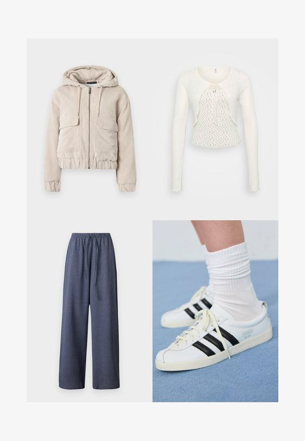 Kurz geschnittene beige Cordjacke mit Kapuze, Frontreißverschluss und zwei Fronttaschen; strukturierter Stoff und elastische Bündchen sowie Saum.; Weißer Pullover mit langen Ärmeln und rundem Halsausschnitt, strukturiertem Stoff, Frontknotenverschluss und gewelltem Saum mit kleinen Blumenmustern.; Weite Hosen in Marineblau, aus strukturiertem Material, mit elastischem Bund und verstellbarem Zugband. Keine Taschen sichtbar.; Weiße Ledersneaker mit schwarzen Streifen, cremefarbener Sohle und hellen Schnürsenkeln. Getragen mit weißen gerippten Socken, positioniert vor einem blauen Hintergrund.