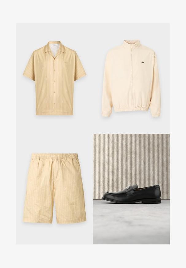 Veste beige à fermeture éclair avec poignets et ourlet élastiques, col montant, et petit logo crocodile vert sur le côté gauche de la poitrine.; Chemise beige à manches courtes avec des fines rayures verticales blanches et des motifs brodés blancs subtils, dotée d'un col de style camp.; Shorts à taille élastique beige avec fines rayures blanches verticales et motifs légers subtils sur l'ensemble, fabriqués en tissu léger.; Mocassin en cuir noir avec une plaque de marque en métal reposant près d'une table ronde marron sur un sol recouvert de moquette beige.