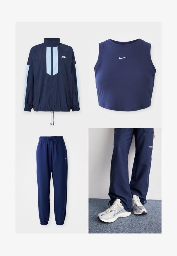 Chaleco cortavientos navy con acentos en azul claro, alto cuello, cremallera frontal completa y puños elásticos. Logo de Nike en el pecho.; Top corto de canalé azul marino con cuello redondo y sin mangas, que presenta un pequeño logo blanco de Nike en el pecho.; Pantalones de chándal azul marino hechos de una tela suave, que cuentan con una cintura elástica con cordón, puños elásticos y un pequeño logo blanco.; Zapatillas deportivas Nike con parte superior de malla plateada, acentos blancos y suelas texturizadas, combinadas con pantalones azul marino de corte holgado.