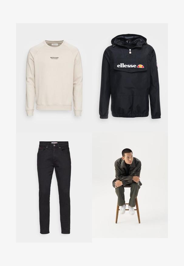 Zwarte windjack met capuchon, voorzien van een rits aan de voorkant en een grote zak. Het "ellesse" logo is prominent aanwezig. Elastische manchetten en zoom.; Crème-kleurige sweatshirt met raglanmouwen, ribgebreide manchetten en zoom. Bevat een zwart tekstlogo aan de voorkant. Zacht, geweven stof.; Zwarte denim jeans met een slim fit, vijf zakken ontwerp en subtiele rode en witte accenten op de voorzak.; Jonge man in een donkere leren jas en spijkerbroek zit op een houten kruk, leunt naar voren met gekruiste armen en kijkt naar de zijkant tegen een witte achtergrond.