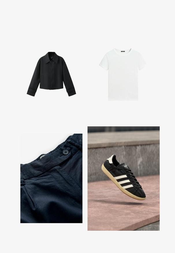Veste courte noire avec col large, manches longues, poignets boutonnés et fermeture à boutons sur le devant.; T-shirt blanc uni à manches courtes avec un col rond et une petite étiquette noire à l’intérieur du col.; Pantalons bleu marine en tissu léger avec une ceinture plate, fermeture à bouton et texture subtile. Comprend des poches et des détails de couture.; Baskets Adidas noires avec des bandes blanches et une semelle beige, capturées en plein air au-dessus d'une surface en pierre et d'un mur en pierre en arrière-plan.