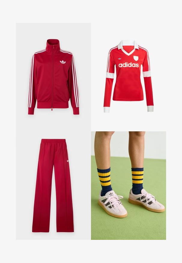Rode trainingsjas met witte drie-streep details op de mouwen, volledige rits aan de voorkant, hoge kraag en wit Adidas trefoil-logo op de borst.; Rode lange mouwen voetbalshirt met een witte kraag en manchetten. Heeft drie witte strepen op de schouders en het "adidas" logo prominent weergegeven.; Rode trainingsbroek met wijd uitlopende pijpen, elastische tailleband, zijzakken met rits, witte strepen aan de zijkanten en een klein wit logo op de linker dij.; Lichtroze suède sneakers met zwarte strepen en rubberen gummizolen, gecombineerd met marineblauwe en gele gestreepte rib sokken. Groene gestructureerde vloer.