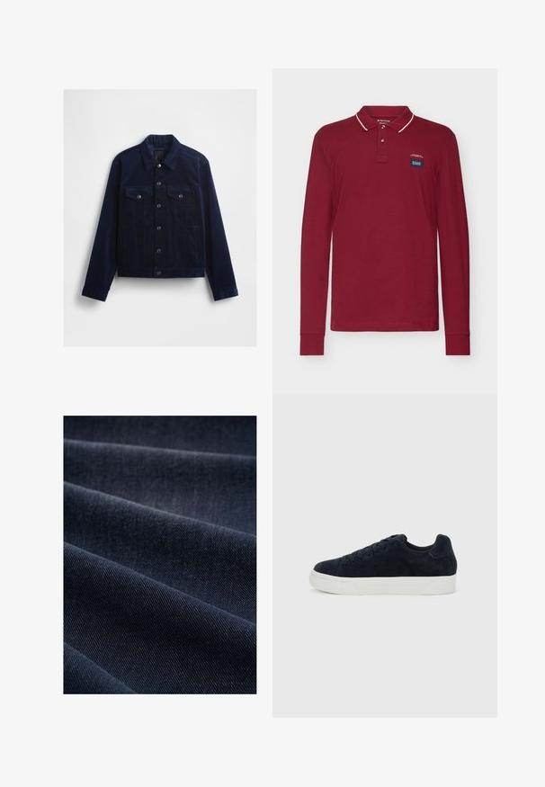 Dunkel marineblaue Cordjacke mit Knopfleiste, zwei Brusttaschen und klassischem Kragen. Glatte Textur und maßgeschneiderte Passform.; Langärmliges Polohemd aus burgunderfarbener Baumwolle, mit einem kontrastierenden weißen Kragen und Akzentnähten, sowie einem kleinen Markenlabel auf der Brust.; Dunkelblaue Denim-Stoff mit geripptem Muster, das Falten und Wellen zeigt und somit sein Gewicht und seine Strapazierfähigkeit betont.; Schwarzer Sneaker aus Wildleder in niedriger Ausführung mit schwarzen Schnürsenkeln und dicker weißer Gummisohle, seitlich auf einem einfarbigen hellgrauen Hintergrund dargestellt.