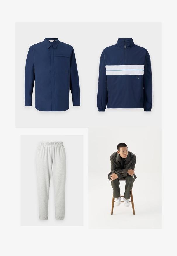 Tumesinine pullover-jakk kõrge kaelusega, millel on valge horisontaalne triip ja helesinine aktsent rinnal. Elastsed mansetid.; Tumesinine pikkade varrukatega särk, millel on nööpidega kaelus, üks rinnatasku ja sileda tekstuuriga kangas. Taskul on väike logo.; Helehallid täispikkused dressipüksid, millel on elastne vöökoht ja pahkluuotsad, eksponeeritud ühtlasel heledal taustal.; Noor mees tumedas nahktakšis ja teksades istub puidust pingil, kaldub ette, käed rüpes, vaatab valgel taustal küljele.