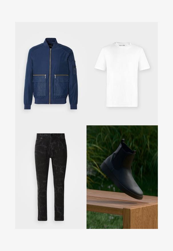 Marine bomberjack met een rits aan de voorkant, denim accenten op twee voorzakken en een gaaszak op de linkermouw. Textuurstof.; Effen wit T-shirt met korte mouwen en een ronde hals, voorkant getoond tegen een lichtgrijze achtergrond zonder zichtbare logo's.; Zwarte spijkerbroek van denim met een gemarmerd patroon, rechte pijpen, vijf zakken en een knoopsluiting bij de tailleband.; Zwarte leren enkelboot met elastische zijpanelen, gladde textuur, ronde neus en platte zool, geplaatst boven een houten tafel tegen een groene achtergrond.